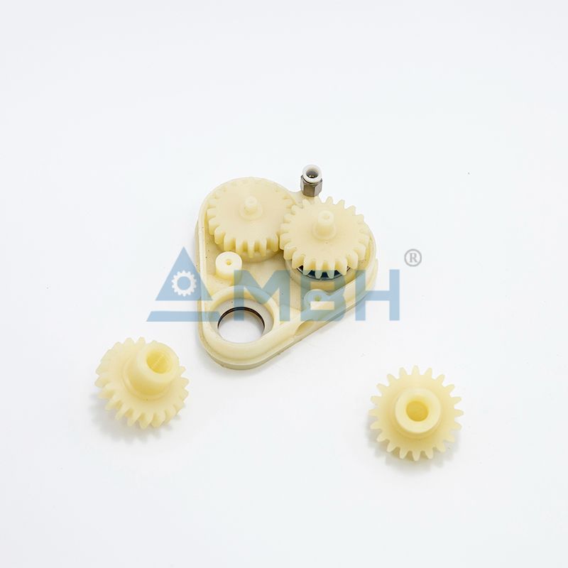 POK polyketone gear assembly with multiple spur gears and mounting bracket machined by MBH