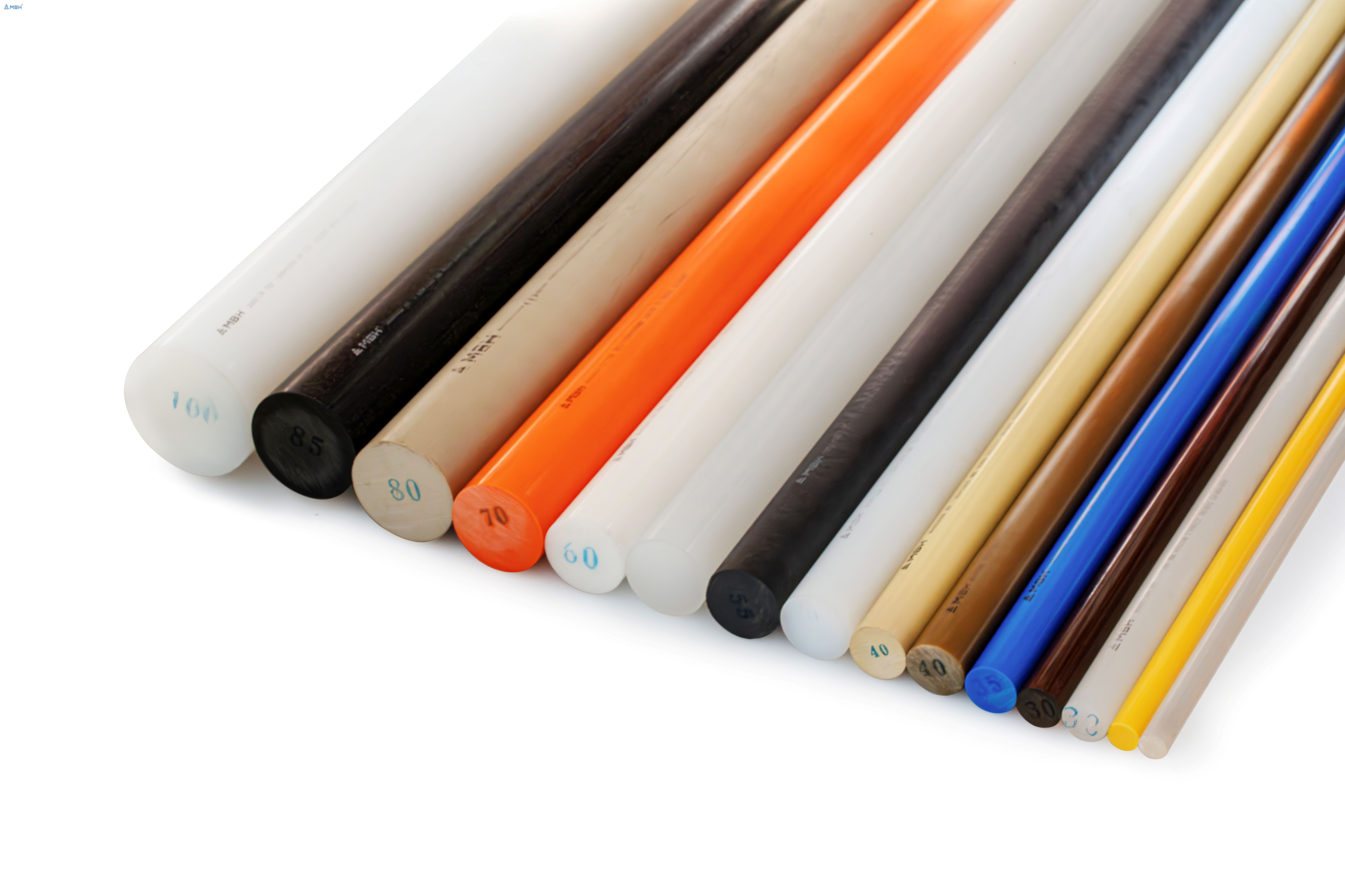 Various engineering plastic rods including POM, Nylon, and PEEK stock shapes