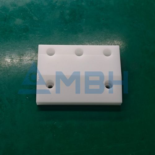 PTFE precision machined multi-hole mounting plate chemical resistant component by MBH