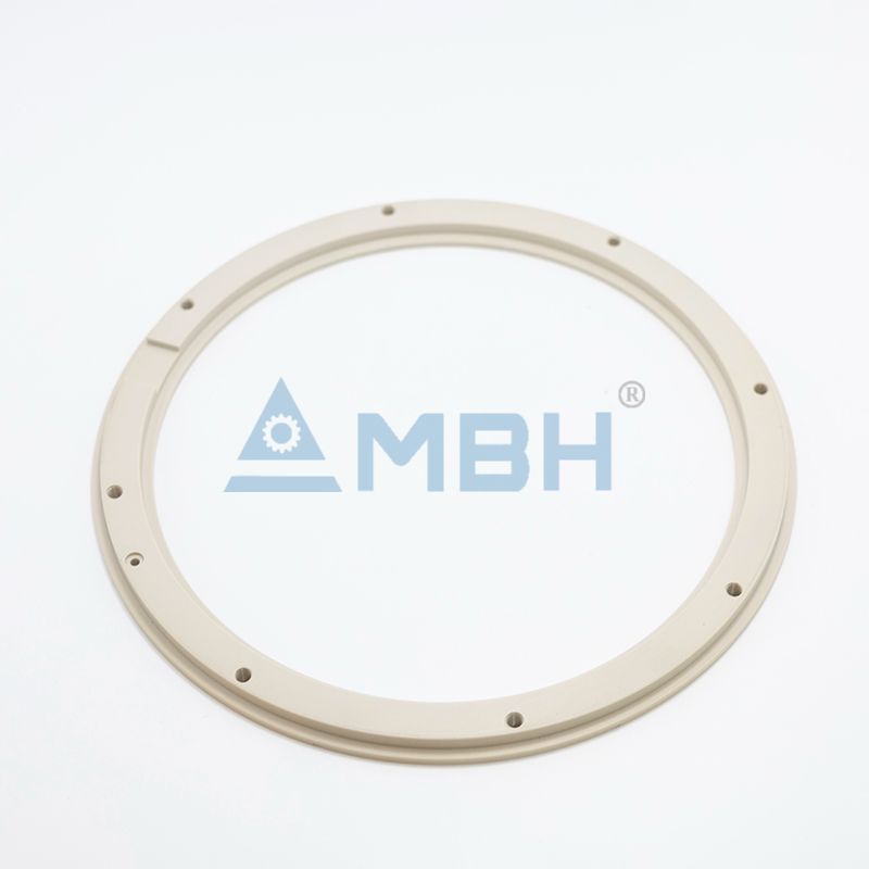 PEEK polyetheretherketone large flange ring with mounting holes precision machined semiconductor component by MBH